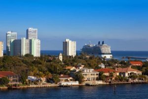 Cruise Ship leaving Fort Lauderdale port behind condo buildings image