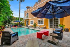 Pool and lounge area behind 624 NE 29th Drive townhomes in Wilton Manors.